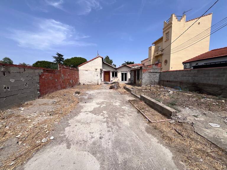 Maison de plain-pied de 95 m² environs avec travaux à prévoir sur un terrain de 509 m² proche de l'aéroport — photo 1