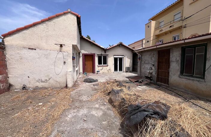 Maison de plain-pied de 95 m² environs avec travaux à prévoir sur un terrain de 509 m² proche de l'aéroport — photo 2