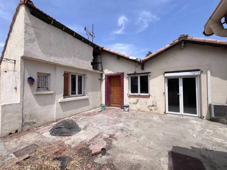 Maison de plain-pied de 95 m² environs avec travaux à prévoir sur un terrain de 509 m² proche de l'aéroport — photo 1