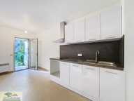 Appartement en rez-de-jardin — photo 2