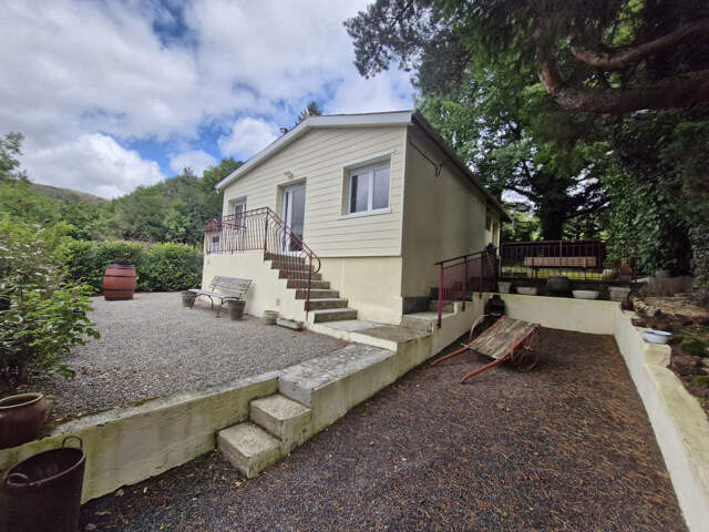 maison d'environ 50 m2 sur 330 m2 de terrain — photo du bien