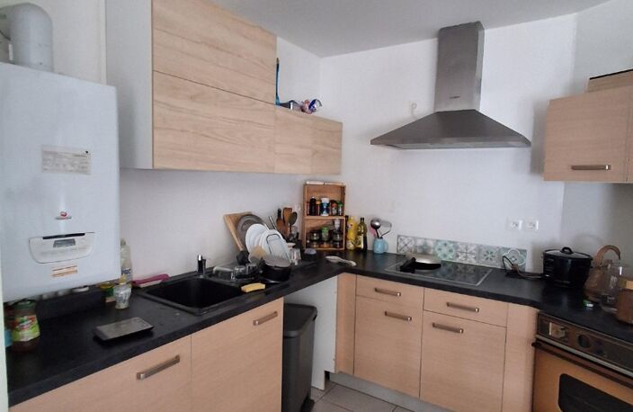Location appartement 3 pièces 62 m² à Lyon 7 (69007) — photo 2