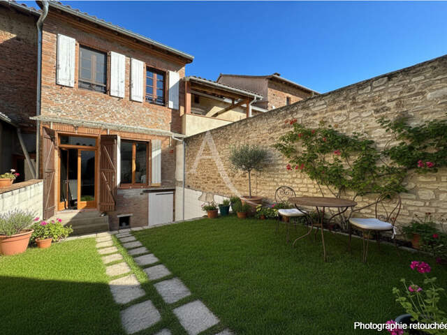 Maison  de  village   garage et cours et atelier traversante — photo du bien