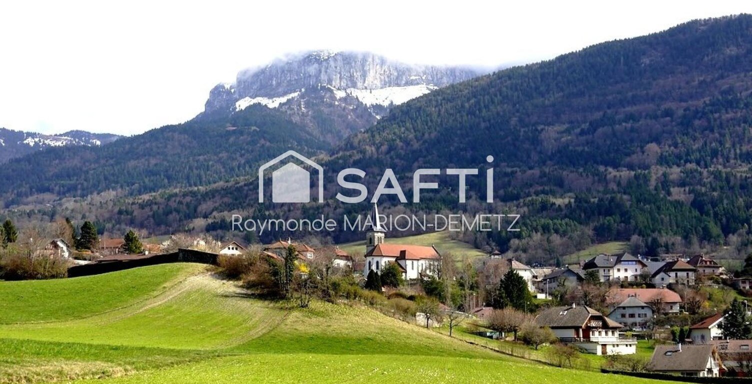 Un cadre privilégié pour une maison rénovée avec soin, à seulement quelques minutes d'Annecy, offrant un cadre de vie paisible, idéal pour une famille, à seulement quelques minutes de toutes commodités. — photo 1