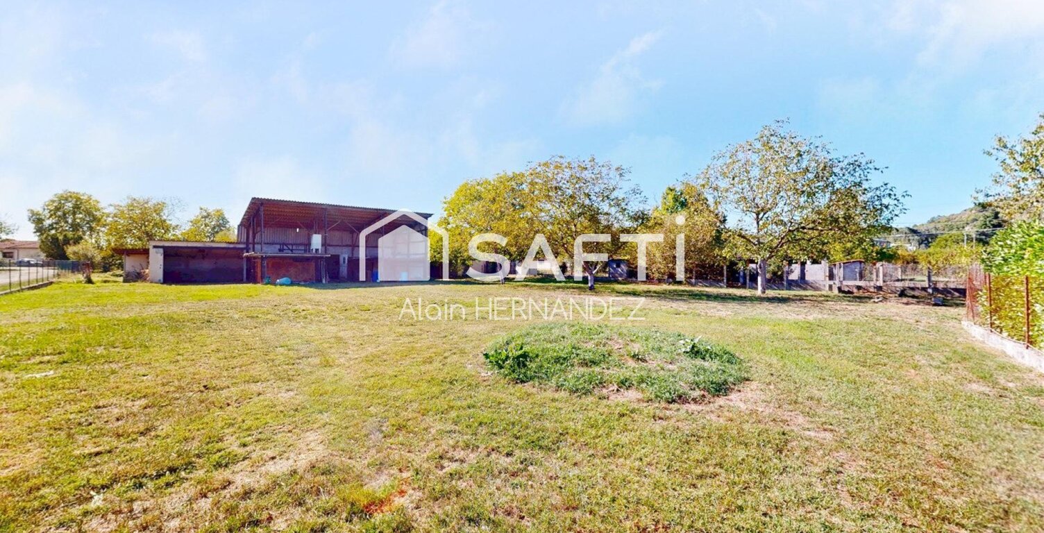 SAINT-MARTORY  TERRAIN CONSTRUCTIBLE D'ENVIRON 2 000 M² AVEC HANGAR — photo 1