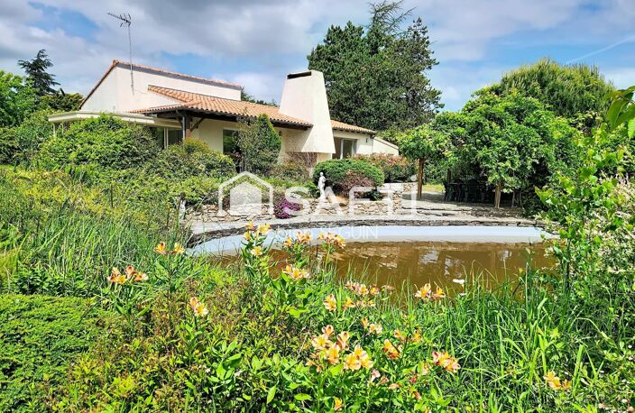 Une vie de plain-pied au calme et au cœur d'un  parc arboré de 7813 m2 — photo 2