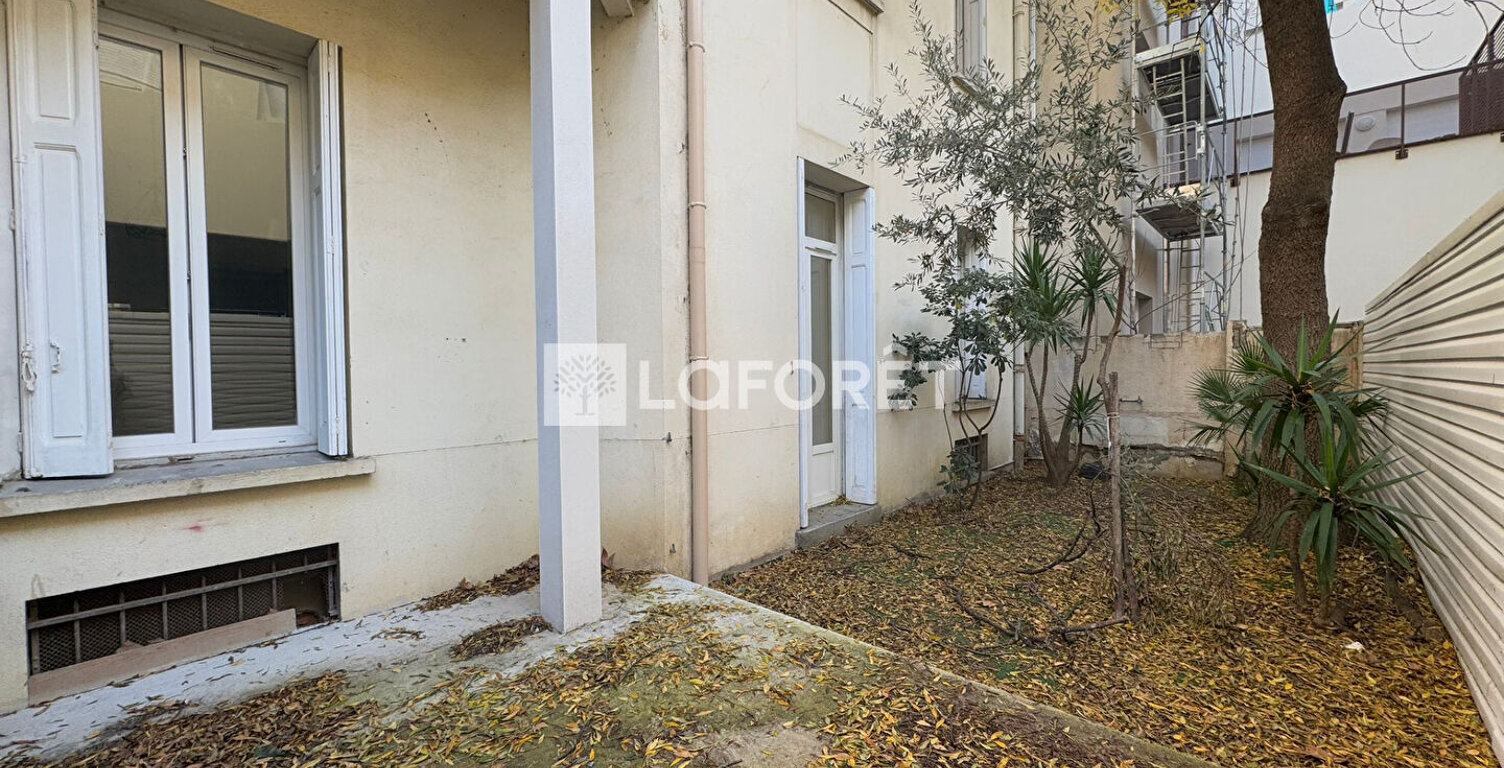 Appartement T2 rez-de-jardin centre ville — photo 1