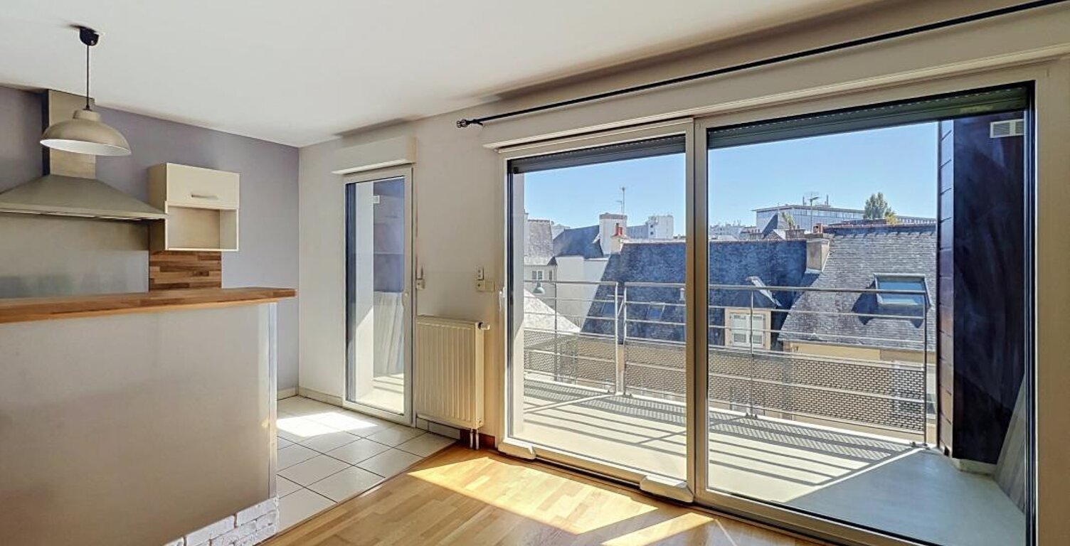 Rennes rue d’Antrain – T3 66 m² balcon sud ascenseur garage parking — photo 1