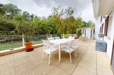 Appartement F3 en rez-de-chaussée avec terrasse de 48 m², grand garage et place de parking — photo du bien