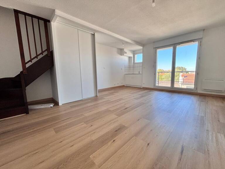 Duplex en dernier étage avec terrasse et parking boxé — photo 1