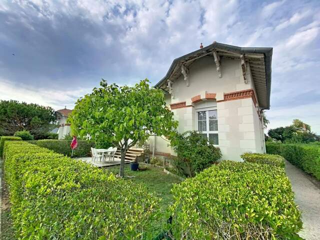 Appartement À Vendre avec jardin, garage et parking privé — photo du bien