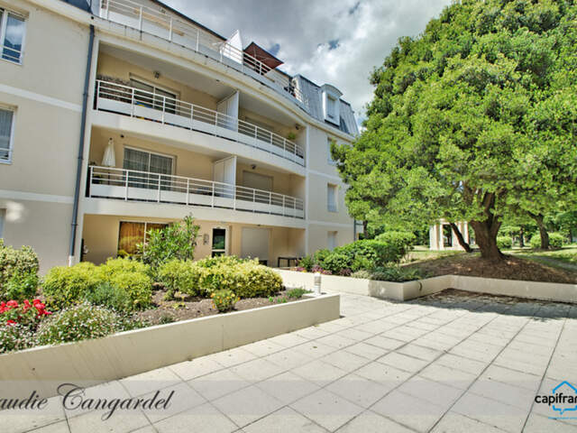 APPARTEMENT 3 PIÈCES AU CŒUR D’UNE RÉSIDENCE DE STANDING AVEC PISCINE, DANS UN ÉCRIN DE VERDURE AUX PORTES DE LA ROCHELLE — photo du bien