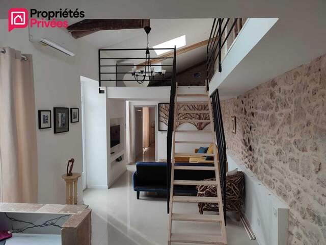 Appartement entièrement rénové avec mezzanine, balcon et stationnement gratuit à Nîmes Pompidou / Jardins de la Fontaine — photo du bien