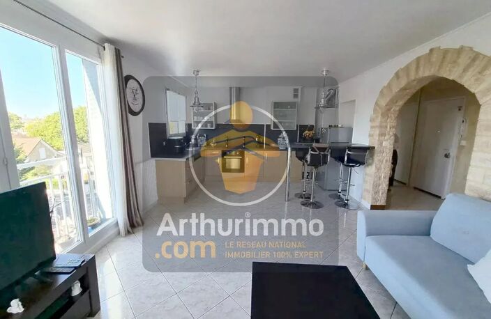 APPARTEMENT 4 PIECES DE 69 M2 - CAVE ET PLACE DE PARKING EXTERIEURE — photo 3