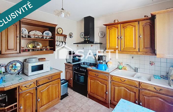 Saint-Amand-Montrond  Maison individuelle de 99 m² avec jardin et garage — photo 4
