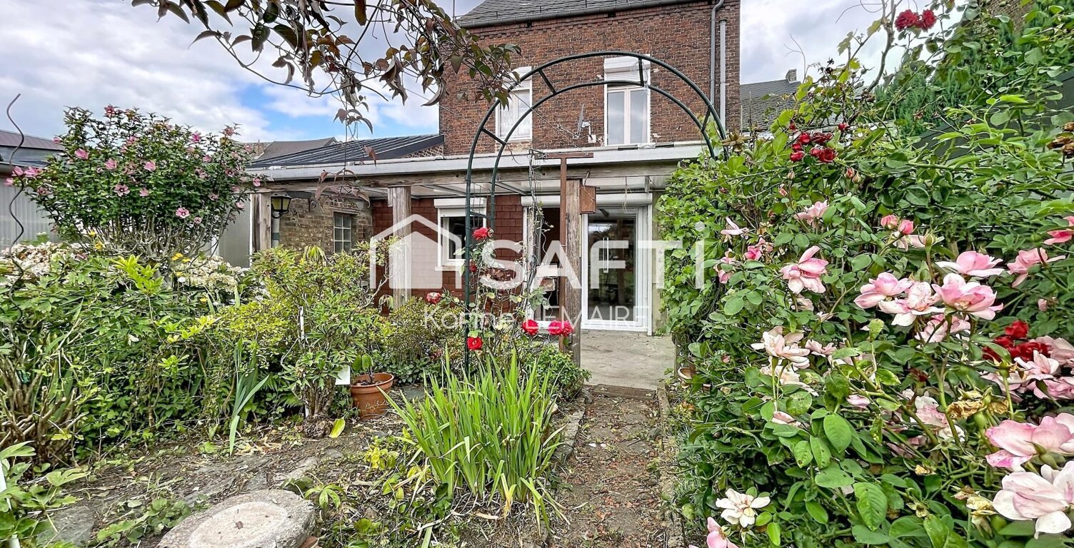 Beau potentiel pour cette maison avec garage et beau jardin — photo 1
