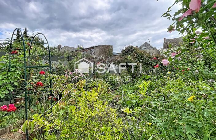 Beau potentiel pour cette maison avec garage et beau jardin — photo 2