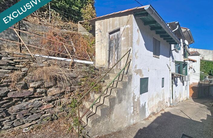 Une maison de village à fort potentiel, avec terrain en terrasses, vue dégagée et grand garage indépendant. — photo 2