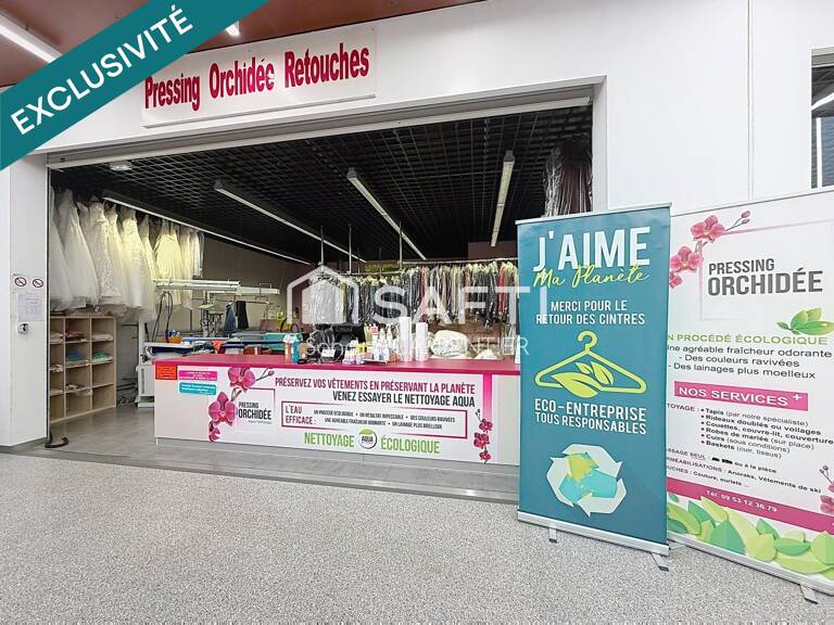 Fonds de commerce Pressing & Retouches idéalement situé dans la galerie commerciale d'Intermarché à Benfeld. — photo 1
