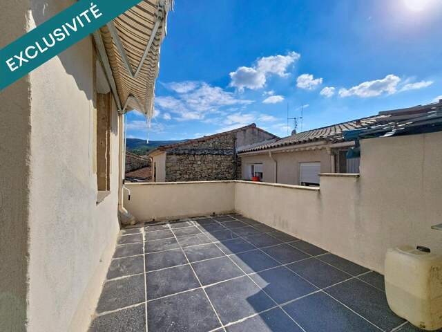 Une spacieuse maison de village de 124 m² avec terrasse tropézienne et beaux volumes au cœur d'Hérépian. — photo du bien