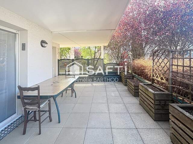 Appartement en rdc de 91m2 avec grande terrasse — photo du bien