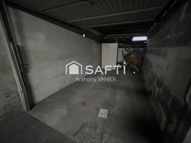 Garage fermé dans résidence sécurisée — photo du bien