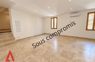T3 appartement rénové avec 2 chambres, terrasse et garage au cur de Magalas — photo du bien