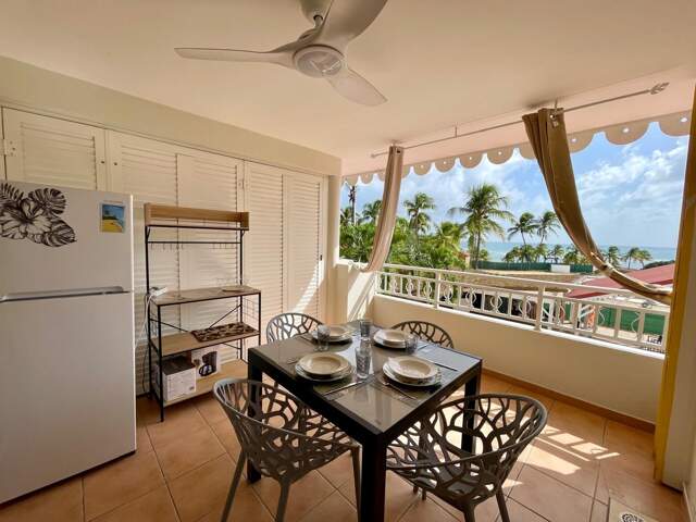 EN EXCLUSIVITE - SAINTE-ANNE – STUDIO PREMIÈRE LIGNE – VUE MER & PISCINE — photo du bien