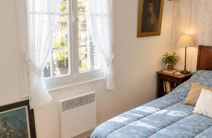 Superbe duplex dernier étage avec jardin et vue incroyable en plein centre — photo 4