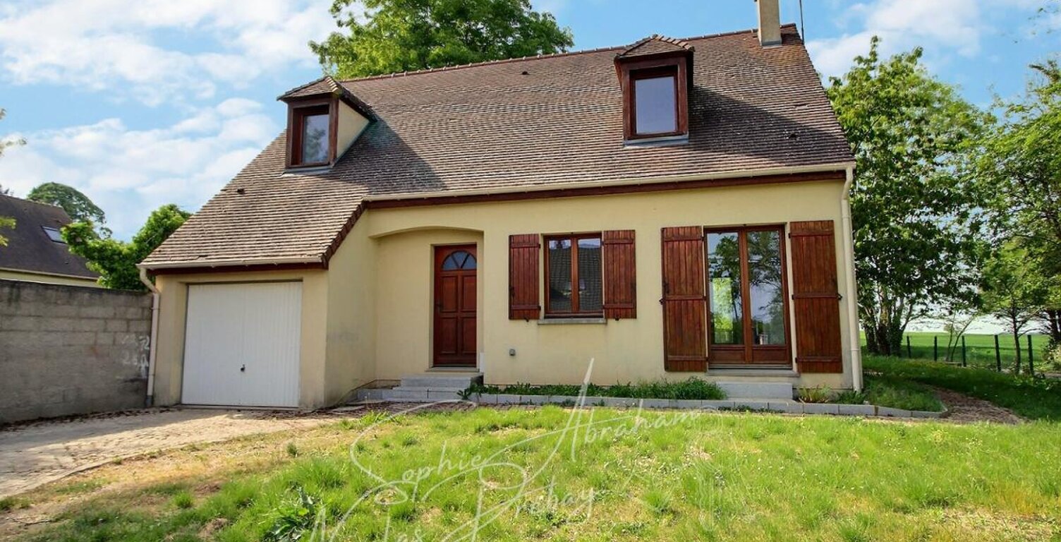 Maison individuelle avec garage et jardin arboré — photo 1