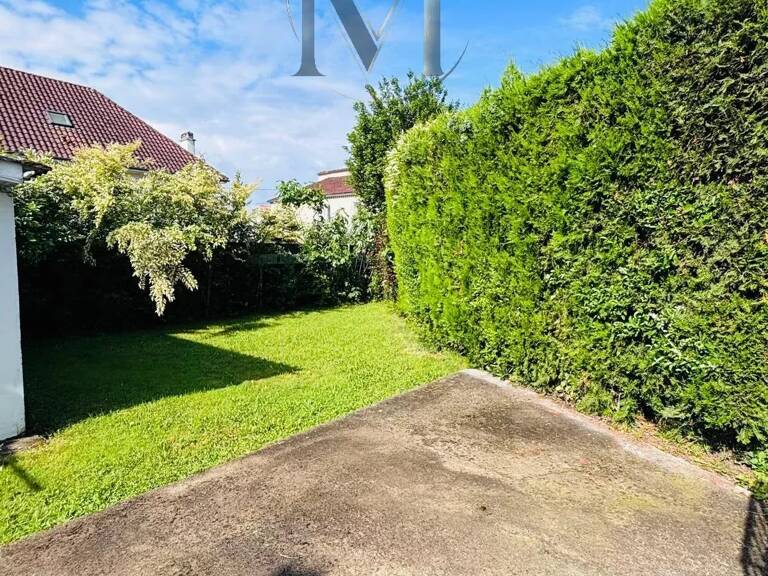 T4 AVEC JARDIN ET GARAGE — photo 1