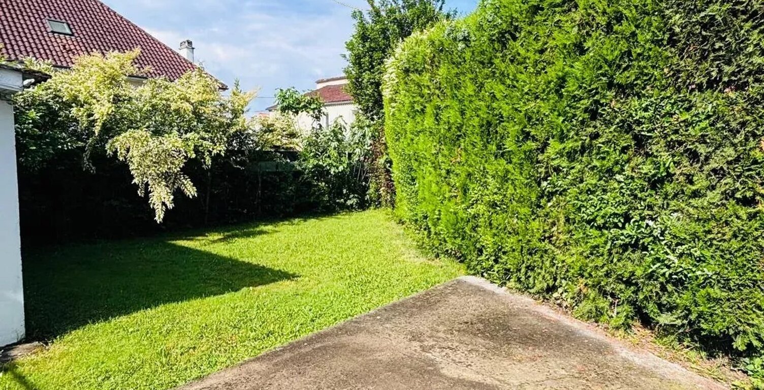 T4 AVEC JARDIN ET GARAGE — photo 1