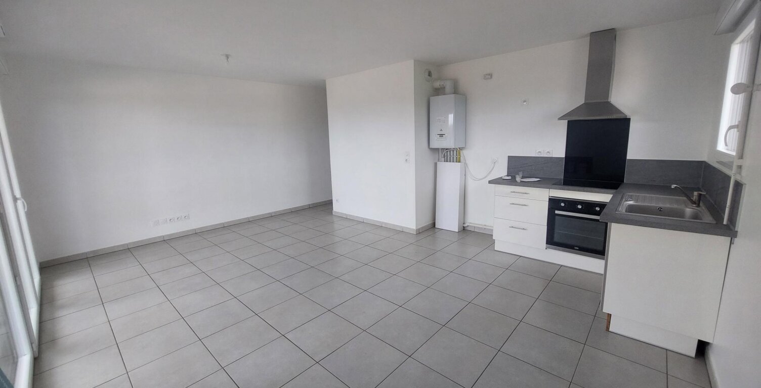 Location appartement 3 pièces 61 m² à L'Isle-d'Abeau (38080) — photo 1