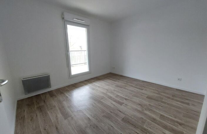Location appartement 3 pièces 56 m² à Bourgoin-Jallieu (38300) — photo 4
