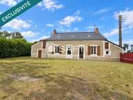 À Rouez-en-Champagne, dans un environnement de campagne agréable, découvrez cette maison de plain-pied offrant de beaux volumes et un ensemble de dépendances particulièrement intéressant. — photo 2