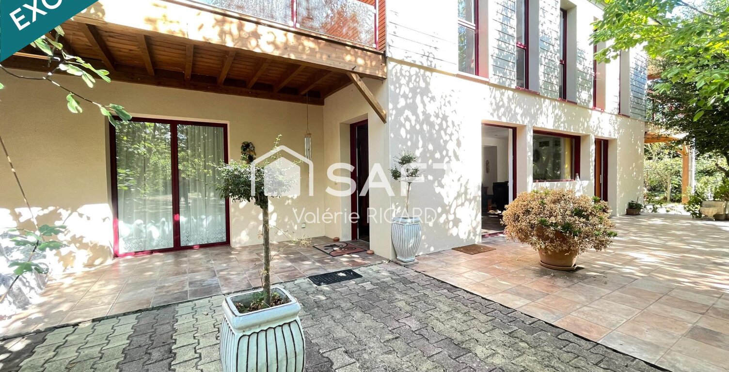 Maison avec jardin, volumes et ambiance chaleureuse — photo 1