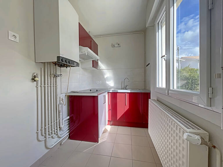 LIBOURNE   APPARTEMENT T2 AVEC JARDIN ET PARKINGS PRIVATIFS — photo 1