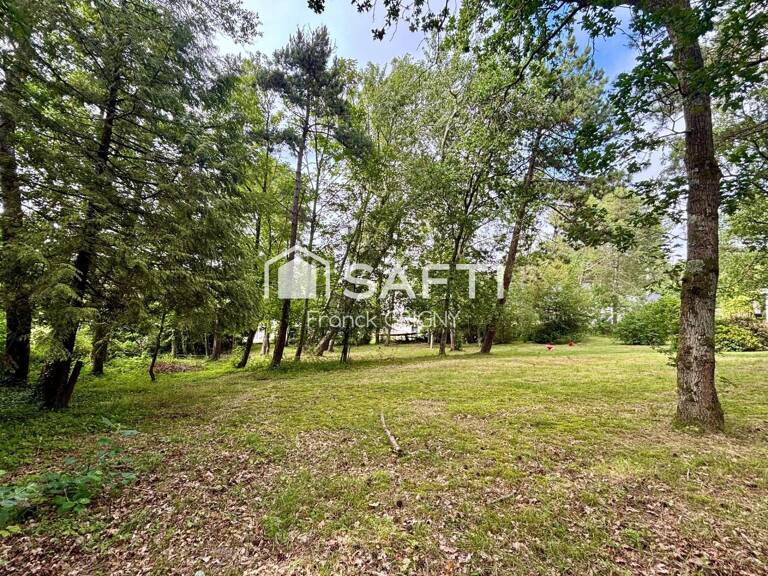 Terrain individuel  constructible en zone boisée — photo 1