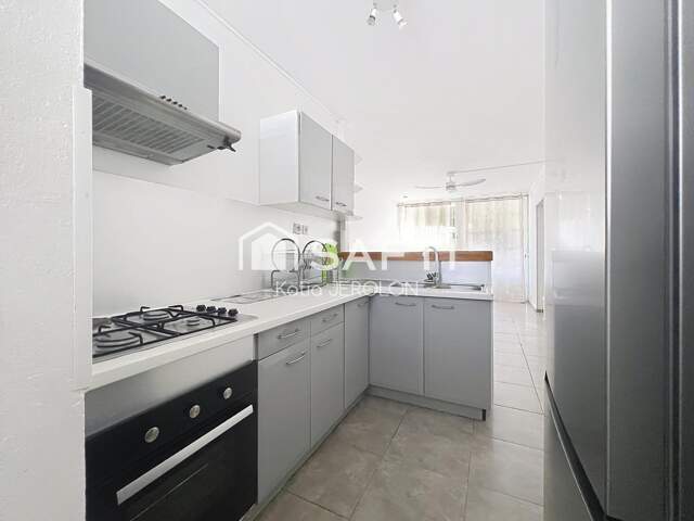 Appartement T4 rénové -proche de toutes commodités et commerces — photo du bien