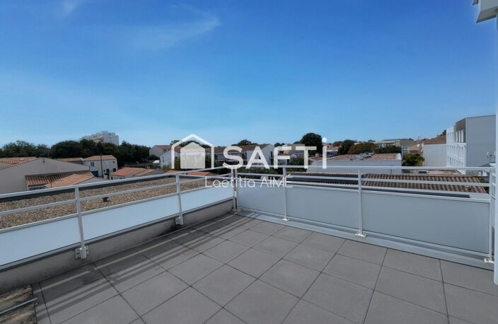 Appartement T2 avec grande terrasse et parking couvert — photo 3