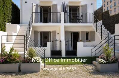 Référence : 7340-MCO - Exclusivité — Immeuble de rapport composé de 4 appartements et une  maison , avec jardin extérieur et stationnements, à Marseille 5e (13005) — photo du bien