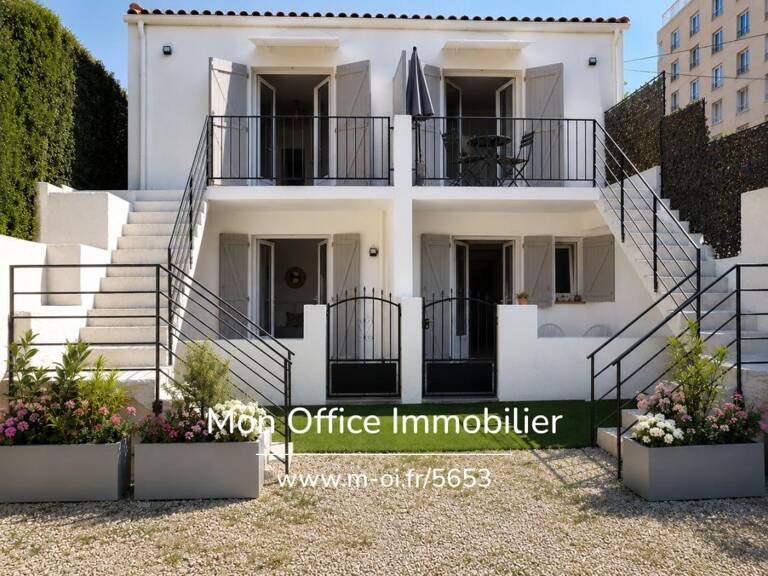 Référence : 7340-MCO - Exclusivité — Immeuble de rapport composé de 4 appartements et une  maison , avec jardin extérieur et stationnements, à Marseille 5e (13005) — photo 1