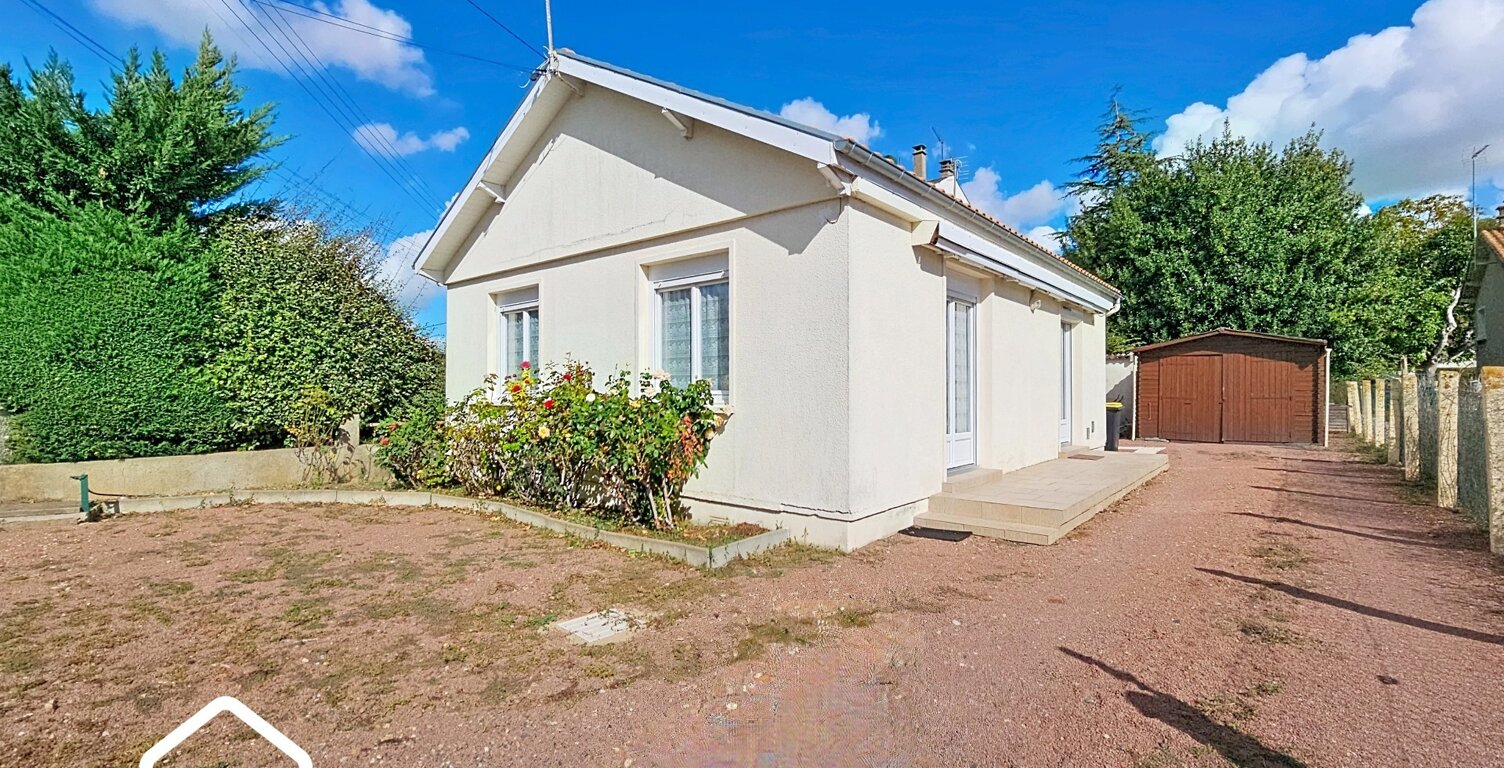 Maison de plain-pied 56 m² – 2 chambres – garage et dépendance – terrain 336 m² – Thouars — photo 1