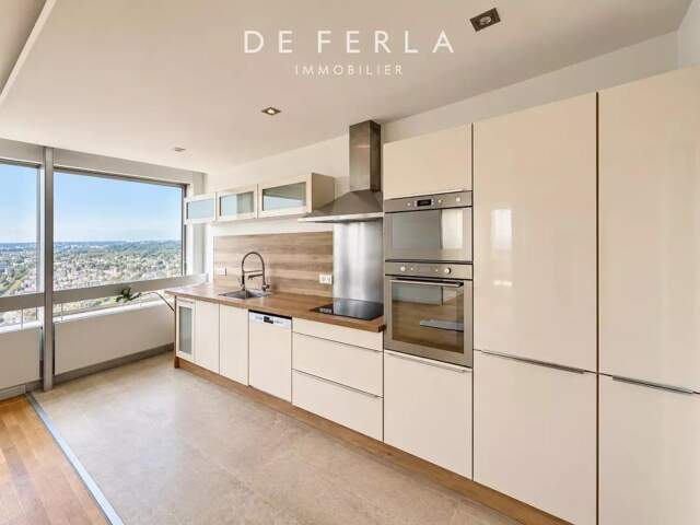 Appartement familial 5 pièces au 40ᵉ étage avec vue panoramique sur Paris — photo du bien
