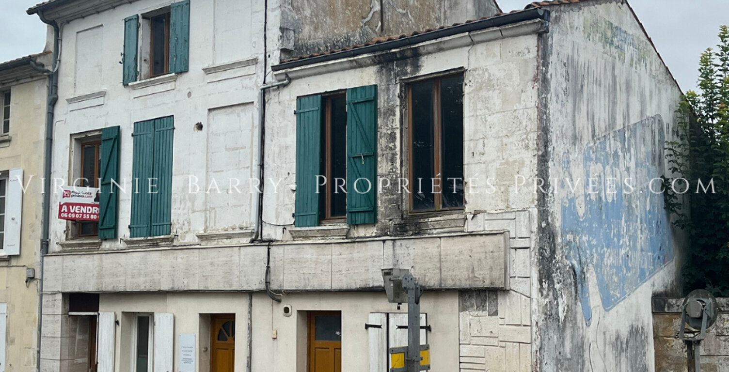 IMMEUBLE COMPOSE DE 4 APPARTEMENTS ET 1 MAISON AVEC JARDIN — photo 1