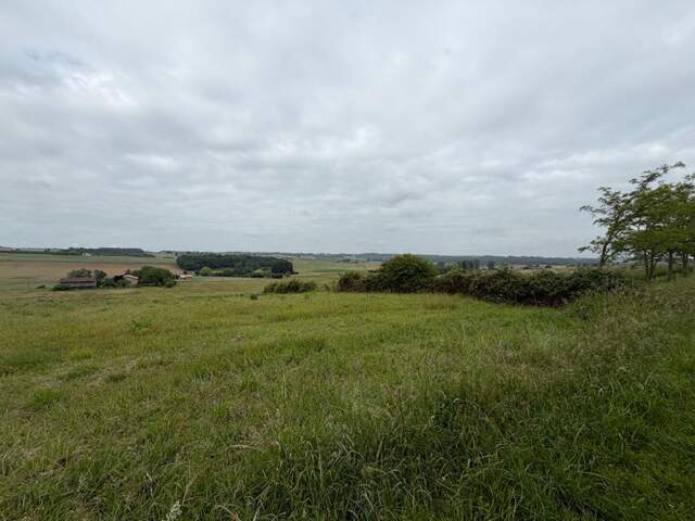 Terrain à bâtir de 1341m2, vue dégagée sur la campagne — photo du bien