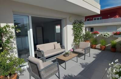 30.GARD.NIMES. Appartement de standing de 69 m² avec terrasse de 46 m² et double garage dans résidence sécurisée — photo du bien