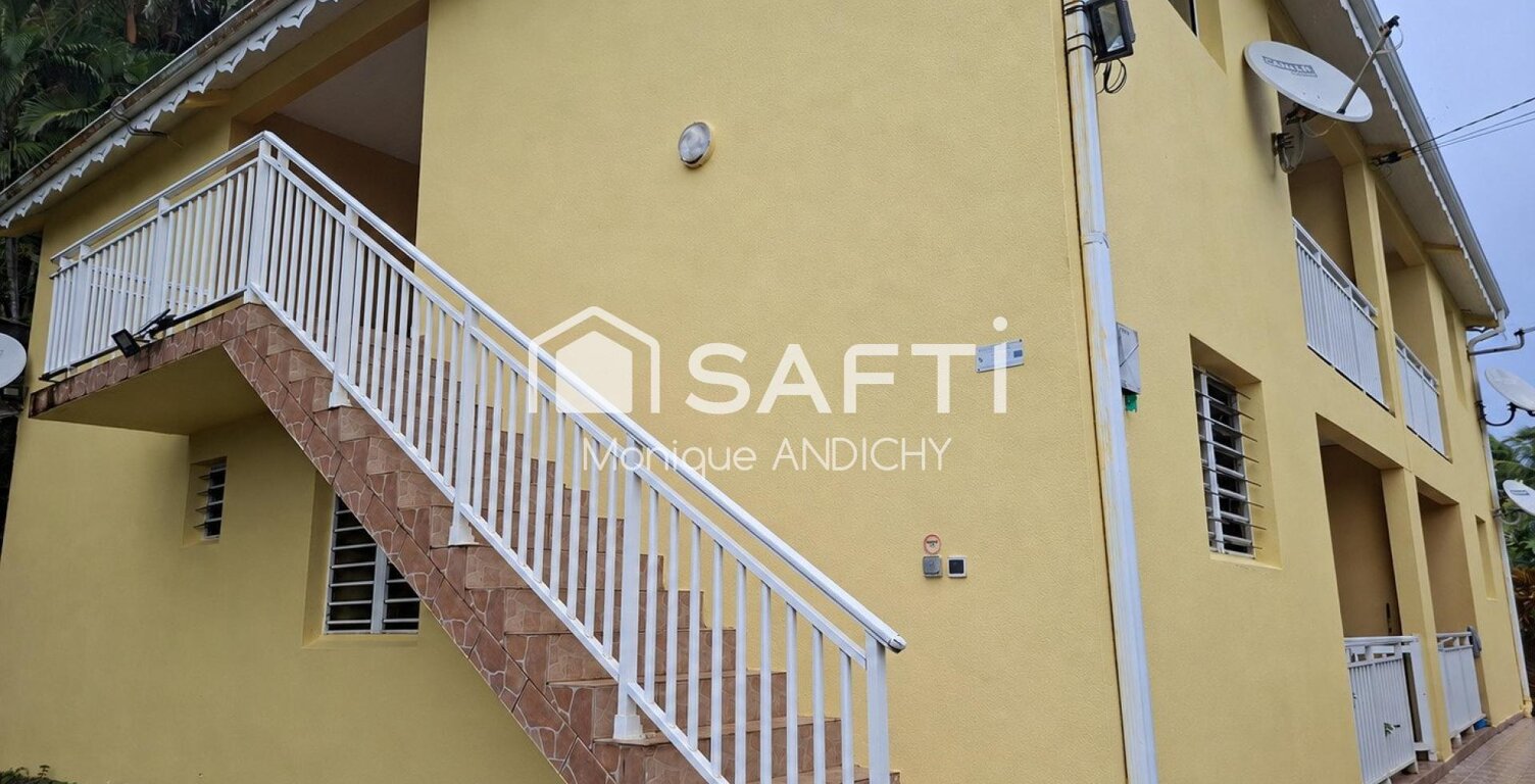 Marigot : immeuble 4 F3 loués, vue mer — photo 1