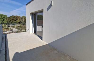 T4 neuf avec grand balcon et parkings — photo du bien