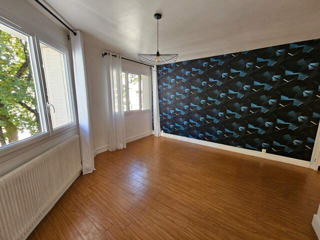 Appartement F4 69 m² situé à 200 m du plan d' eau avec garage — photo du bien